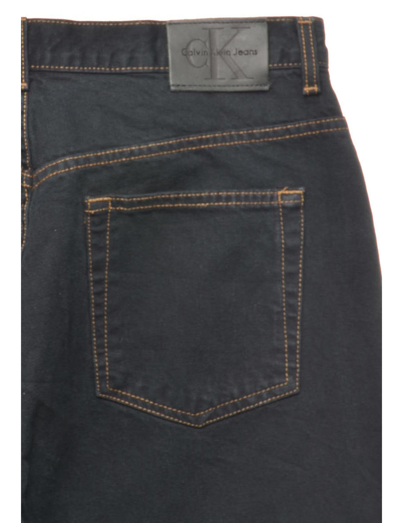 Calvin Klein Dark Wash Tapered Jeans - W33 L30